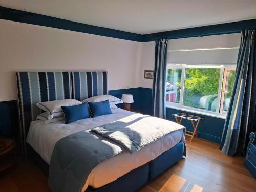 Un ou plusieurs lits dans un hébergement de l'établissement Corrib Lodge