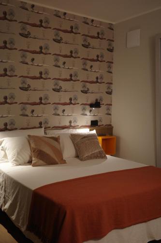 Postel nebo postele na pokoji v ubytování À la plage B