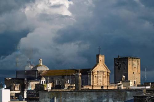 a group of buildings on a city skyline at "Casa Simone" in Leverano