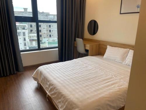 Katil atau katil-katil dalam bilik di FLC SeaTower Quy Nhon