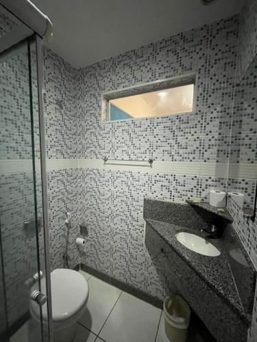 Koupelna v ubytování Joalpa Hotel
