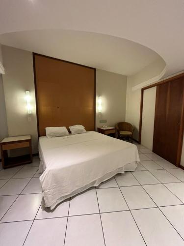 Postel nebo postele na pokoji v ubytování Joalpa Hotel