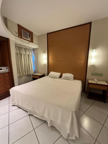 Postel nebo postele na pokoji v ubytování Joalpa Hotel