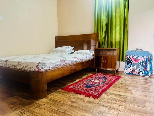 Cama o camas de una habitación en The Tranquil Farm Stay
