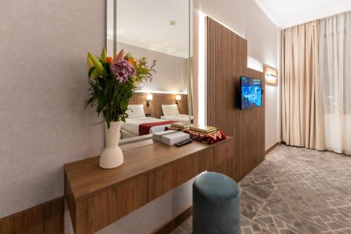 Ένα ή περισσότερα κρεβάτια σε δωμάτιο στο Hayah Golden Hotel