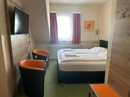 Cama o camas de una habitación en Magnus Klause