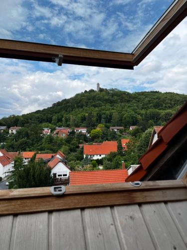 a view of a town from a window at Pension Plesse-Blick Bovenden in Bovenden