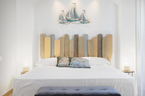 Residenza Aurora del Mareにあるベッド