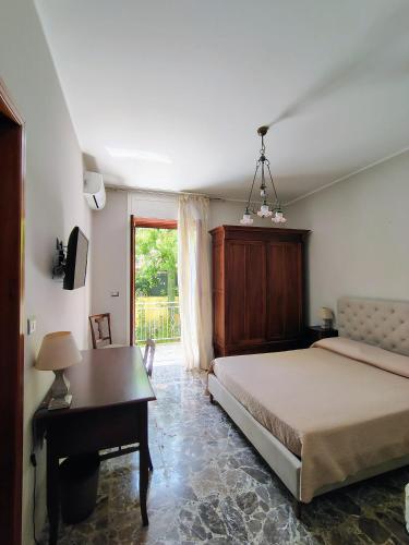 Ένα ή περισσότερα κρεβάτια σε δωμάτιο στο Nostos B&B - Back to the Sea