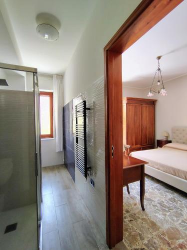 Ένα ή περισσότερα κρεβάτια σε δωμάτιο στο Nostos B&B - Back to the Sea