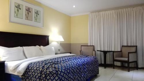 Et rom på Villa Via Hotel Midrand