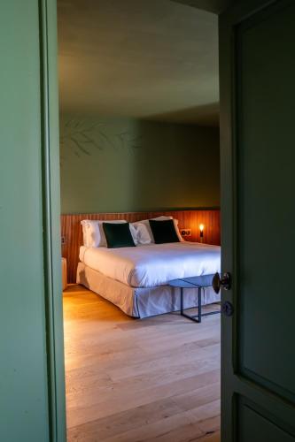 Katil atau katil-katil dalam bilik di Locanda Moderna Carlambroeus