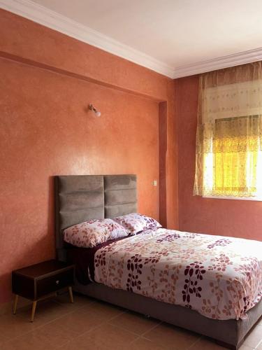 Ένα ή περισσότερα κρεβάτια σε δωμάτιο στο Agadir Signature Charme, Subtil & Raffinement