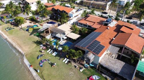 an aerial view of a house with solar panels on it at Toca da Ilha in Itarema
