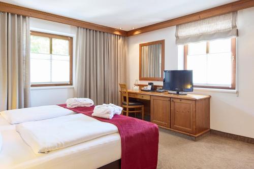 Hotel Hubertusにあるベッド