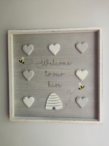 a picture of hearts with a welcome to our hive at The Hive at Glenview in Llandysul