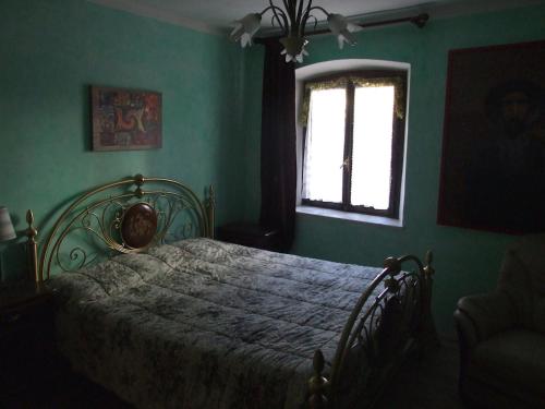 Postel nebo postele na pokoji v ubytování Fauniera Cottage in Valle Stura di Demonte - Cuneo-