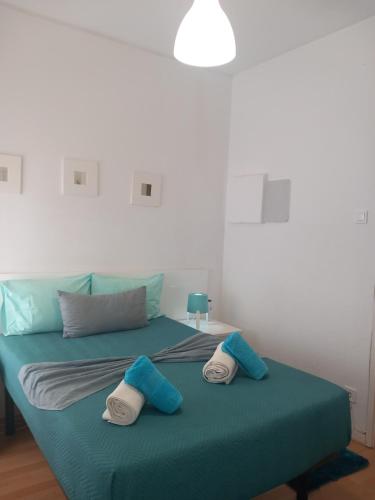 Ένα ή περισσότερα κρεβάτια σε δωμάτιο στο Lila's House