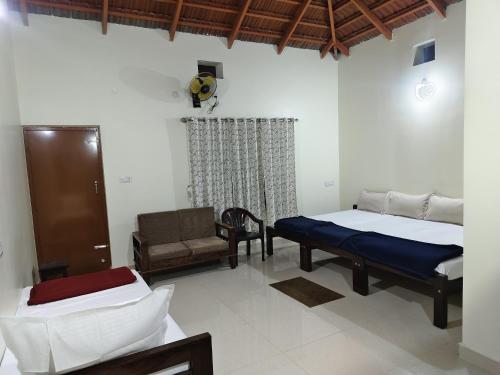 Ένα ή περισσότερα κρεβάτια σε δωμάτιο στο River point homestay