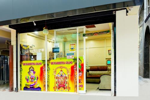 a store front of a store with colorful signs at Hotel O Sri Vishnu Prime Opposite The Studio Salon, Kundalhalli Gate in Bengaluru