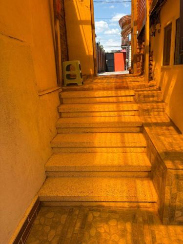 a set of stairs leading up to a building at Old Tbilisi Apartments in Tbilisi City