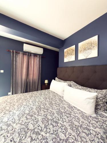 Postel nebo postele na pokoji v ubytování Urban Escape - 1Br 1Bth Condo in Reduit, Rodney Bay, Gros Islet