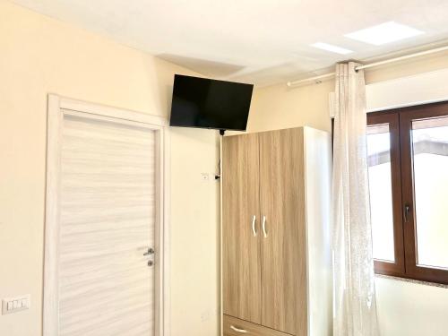 B&B Magusadaにあるテレビまたはエンターテインメントセンター