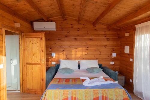 Postel nebo postele na pokoji v ubytování Agriturismo Cinque Tomoli