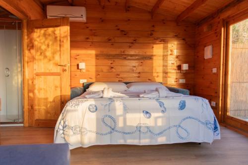 Postel nebo postele na pokoji v ubytování Agriturismo Cinque Tomoli