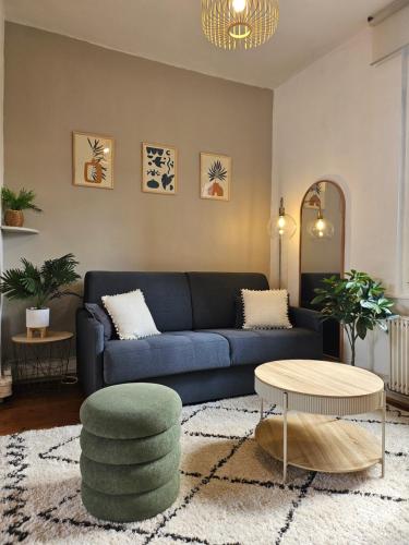 Ruang duduk di Logement charmant - proche gare