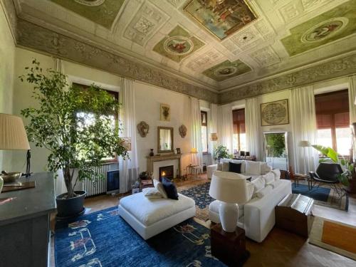 Khu vực ghế ngồi tại Suite della Duchessa - Dimora Storica Affrescata