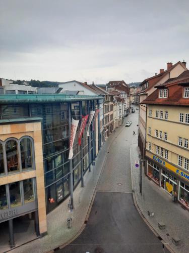a view of a city street with buildings at A7 J22 FeWo Michelangelo NETFLIX Fußgängerzone in Eisenach