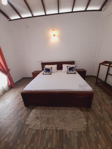 Katil atau katil-katil dalam bilik di Forest Edge Villa
