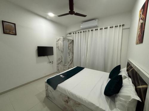 Photo de la galerie de l'établissement Atithi Homes Luxe Kandivali Suites, à Mumbai