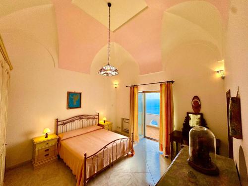 En eller flere senge i et værelse på Vista Vettica