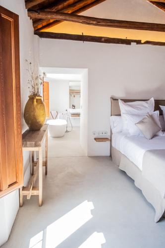 Postel nebo postele na pokoji v ubytování Cortijo de la Seda