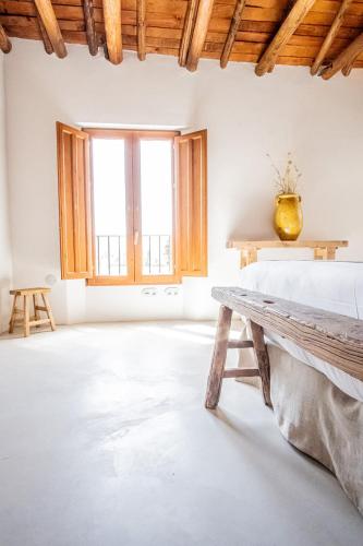 Postel nebo postele na pokoji v ubytování Cortijo de la Seda