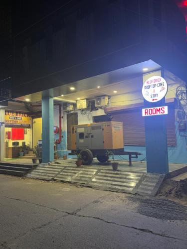 a garage with a truck parked inside of it at Blue Brick in Jodhpur