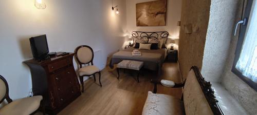 Кровать или кровати в номере Casa Rural Casona Camino Pedraza - 4 Estrellas