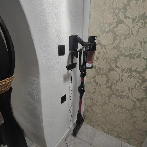 a mobility scooter is plugged into a wall at Frida' s Mansion in Dhragoulás