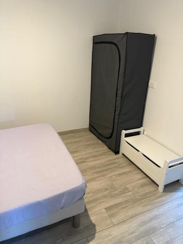 Ένα ή περισσότερα κρεβάτια σε δωμάτιο στο Joli bas de Villa