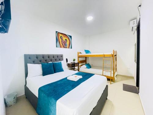 Ένα ή περισσότερα κρεβάτια σε δωμάτιο στο ANAJIRAWAA HOTEL