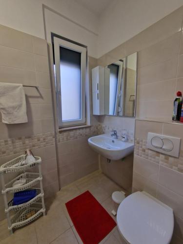 Ένα μπάνιο στο Apartament , White Rocks, Drimadhe