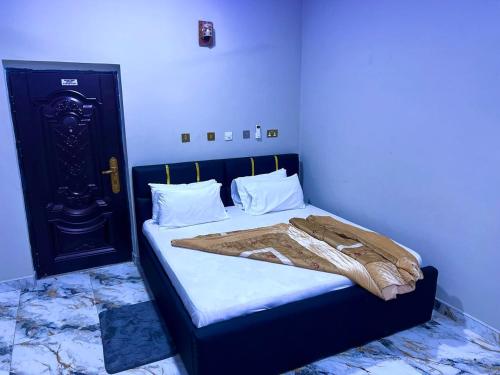 Ένα ή περισσότερα κρεβάτια σε δωμάτιο στο King Power Hotel