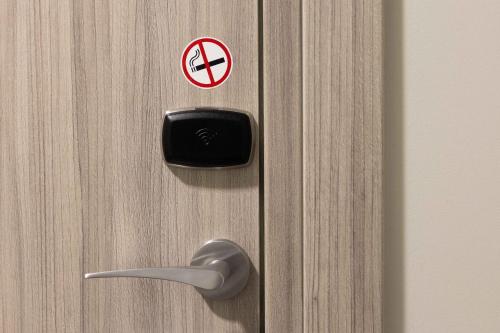 a door with a do not enter sign on it at Hotel Combarro in Combarro