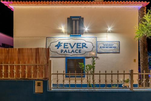 a ever palace sign on the side of a building at 4Ever Palace Design&Nature in Alcácer do Sal