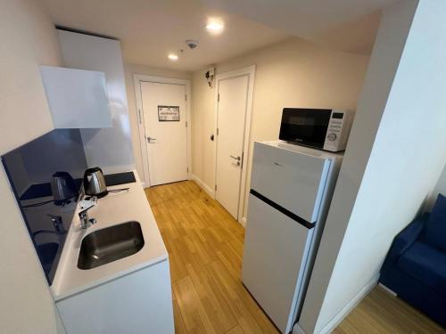 Η κουζίνα ή μικρή κουζίνα στο Orbi city C block Panorama 3bedroom