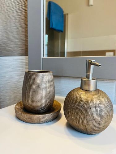a bathroom sink with a faucet on a counter at Agriturismo Il Molino in Quercianella