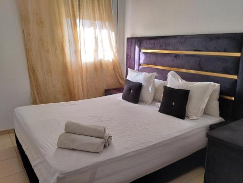 Una cama o camas en una habitación de Dar Yasmine 2