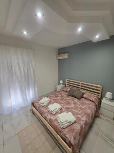 Postel nebo postele na pokoji v ubytování HomeSweetHome